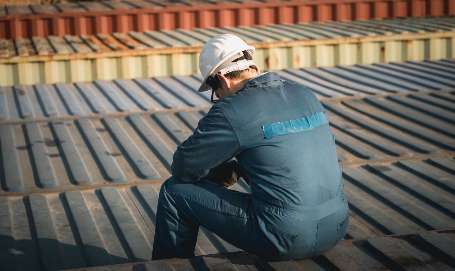 lonely-foreman-worker-lost-depression-containers-box-cargo-feeling-sadness-concept (1)