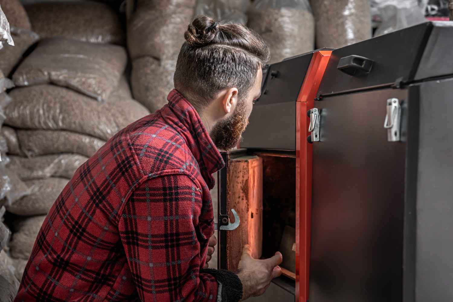 man-room-with-solid-fuel-boiler-working-biofuel-economical-heating (1)